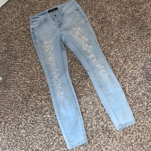 Wax light wash ripped jeans